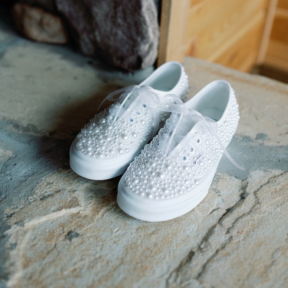Pearled white vans size 7.